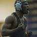 Pioneer Quandre Thomas celebrates after pinning his opponent in the final seconds of the match on Wednesday, Feb. 6. Daniel Brenner I AnnArbor.com